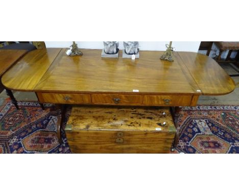 An Antique mahogany sofa table, with 3 short drawers raised on quadruple turned columns and shaped legs, L115cm extending to 