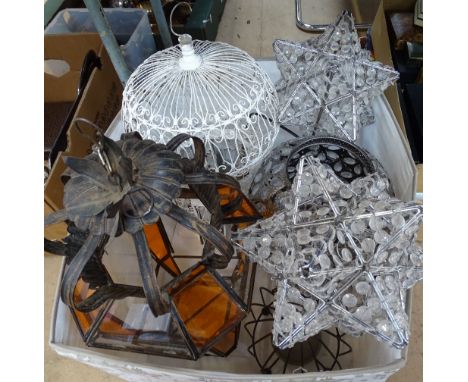 A group of modern Moroccan style lantern light shades, a wirework ornamental birdcage, starburst light shades etc 