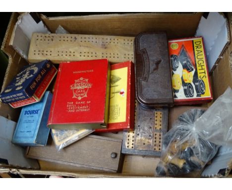 A collection of Vintage card games, cribbage markers, chessmen etc 