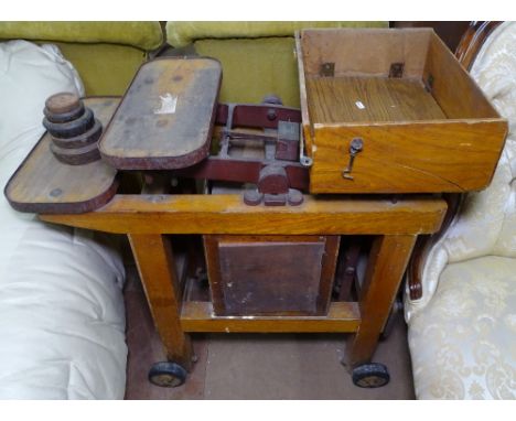A Vintage oak and cast-iron baby's weighing scales, by Fairburn Brothers Maidstone 