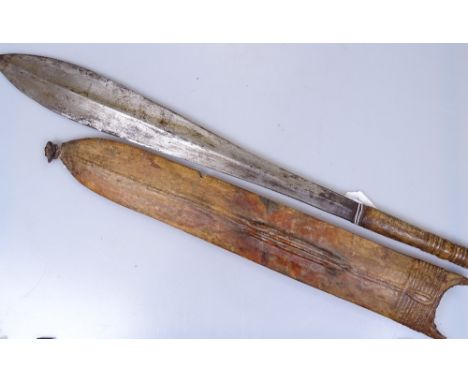 A Masaai edged weapon, length 25", in leather scabbard 