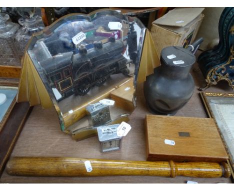 A mixed lot, comprising a cased set of drawing instruments, an Art Deco chrome-cased 8-day travelling clock, an oak truncheon