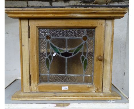 A small hanging pine corner cabinet, with lead light glazed door, W67cm, H52cm 