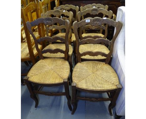 A set of 6 French oak ladder-back dining chairs 