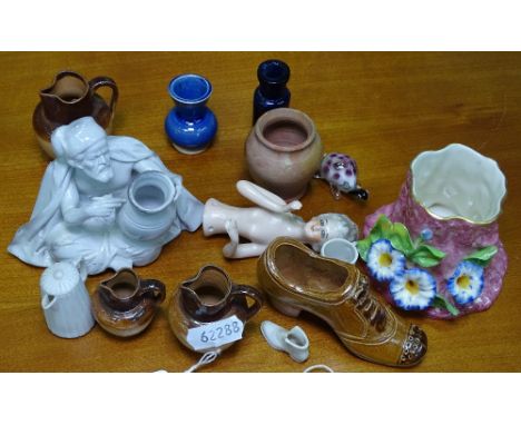 A Continental figure, height 3", a Royal Worcester vase with applied flowers, miniature stoneware jugs, a shoe etc 