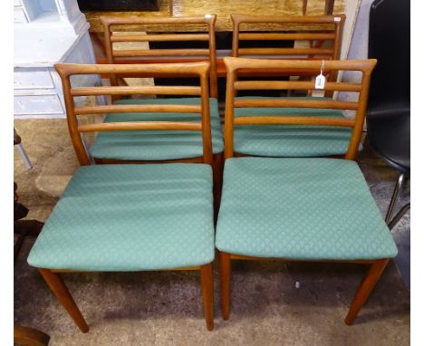 A set of 4 mid-century Danish teak dining chairs, by Erling Torvist of Soro Mobelfabrik, with ladder backs and upholstered se