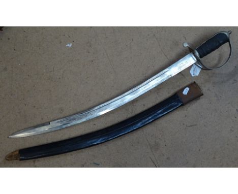 A Spanish Toledo replica sword in scabbard, and an Indian sword in scabbard, length 28.5" 