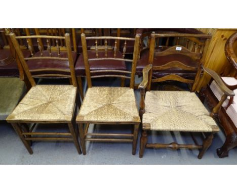 A pair of 19th century rush-seated and spindle-back chairs, and an Antique rush-seated ladder-back elbow chair 