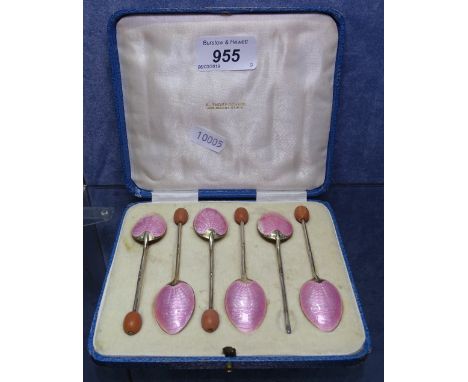 A set of 6 silver and pink enamel coffee spoons, in original case, Birmingham 1931 