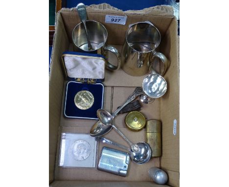 A box containing 2 plated tankards, coins, a lighter etc 