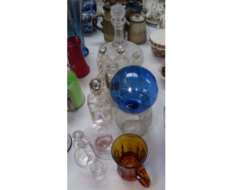 A cut-crystal ship's decanter and stopper, 10", cut-glass decanters, a fishing float etc 