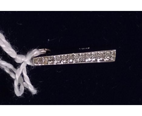 A small 9ct white gold diamond set pendant, length 20mm 