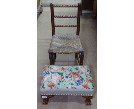 A child's rush-seated oak chair, and a walnut footstool with tapestry upholstery 