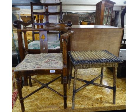 A gold Lloyd Loom occasional table, a corner elbow-chair, and another (3) 