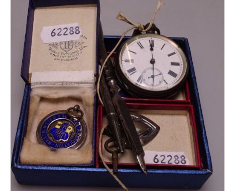 An engine turned silver-cased key-wind pocket watch, 2 silver and enamel fobs, another etc 