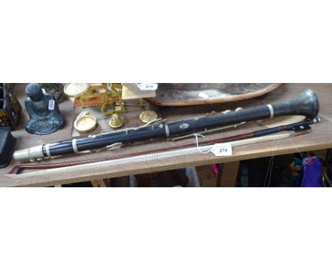 A Vintage clarinet, nickel plate mounts, no maker's marks, together with a violin bow (2) 