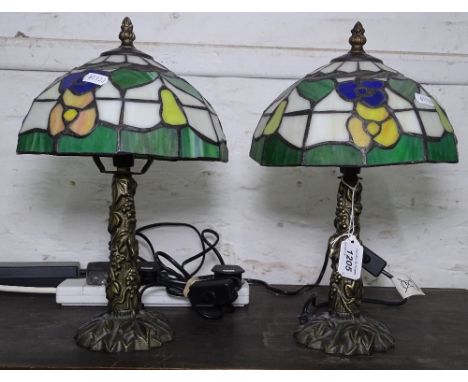 A pair of Tiffany style table lamps, with lead light shades, H34cm 