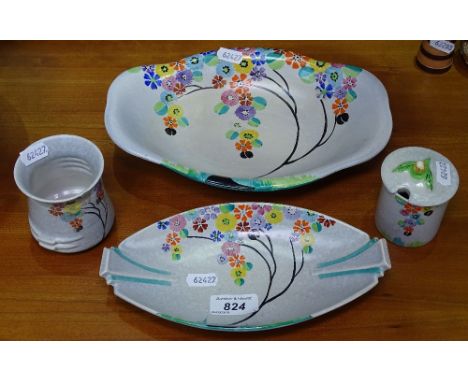 An Art Deco Carlton Ware dish with painted floral decoration, length 8.75", a jam pot, a larger dish, and a toothbrush holder