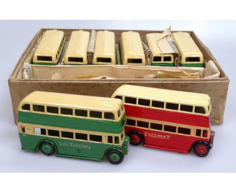 8 Vintage Dinky diecast double decker buses, overpainted with Southdown colours, boxed 