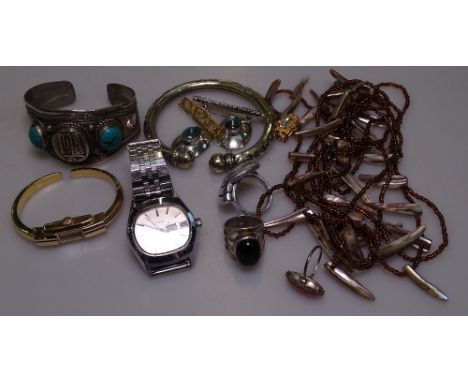 An Oriental white metal and turquoise set bangle, a Timex wristwatch,silver and costume jewellery