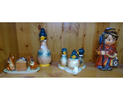 A Goebel's duck cruet, a Hummel lantern in the form of a boy, and a Goebel's dog cruet etc. 