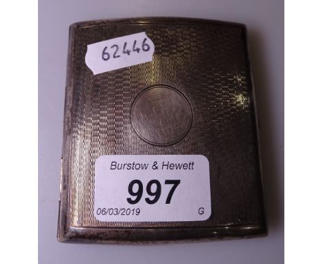 An engine turned silver cigarette case 