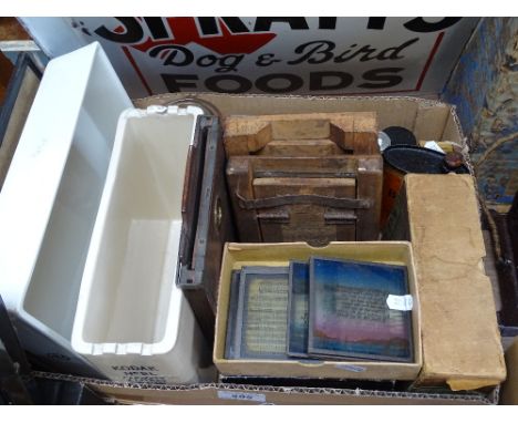 A box of Vintage photographic equipment, including ceramic developing tanks, photographic plates, magic lantern slides etc 
