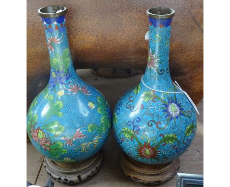 A pair of Japanese early 20th century cloisonne enamel narrow-necked vases on hardwood stands, overall height 11" 