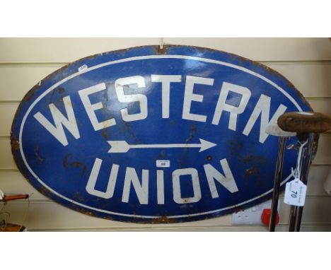 An Antique Western Union oval enamel advertising sign, 33" across 