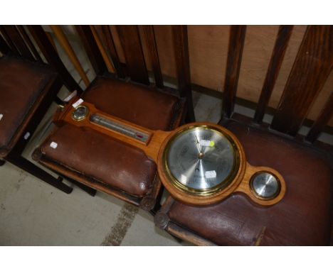 A modern mahogany cased aneroid barometer