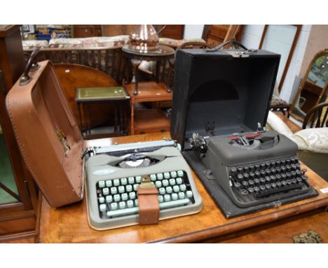 Two vintage typewriters including Hermes baby and Imperial with circular letters