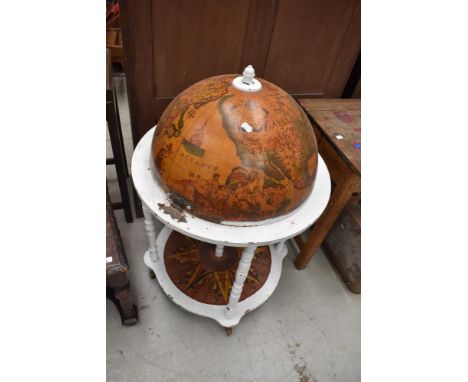 A vintage globe cocktail cabinet