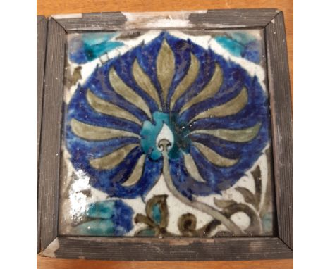 William de Morgan Merton Abbey 'Peacock' tile, 15.2cm square, c.1882-1888, factory stamp verso, in wooden slip frame, 17cm sq