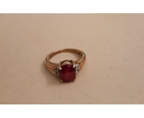 9ct gold, ruby and diamond ring, central ruby approx 1ct, ring size L