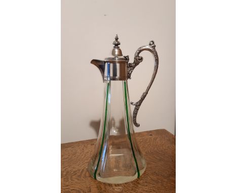 William Powell for Whitefriars claret jug with silver plated mount, tapered clear glass body with applied green trailed pipin