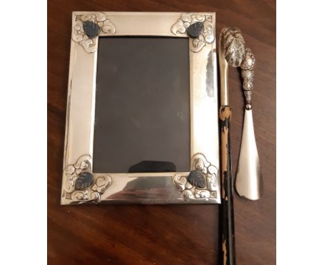 Continental white metal and hardstone set photograph frame, 22cm x 17cm, a silver handled shoe horn and a white metal parasol