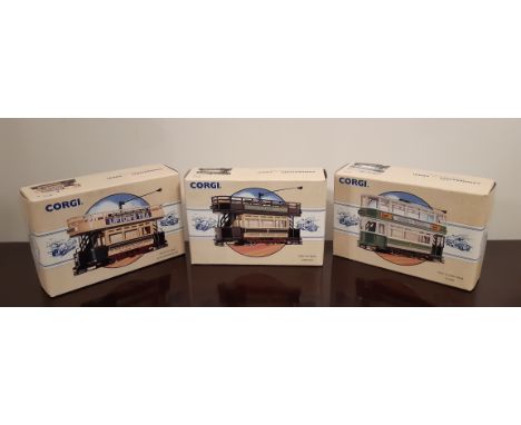 Three Corgi Commercials models - 98150 Open Top Tram Lowestoft, 98151 Open Top Tram South Metropolitan and 98154 Fully Closed