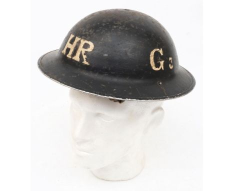 A WWII Mk II pattern Heavy Rescue steel helmet: black with the letter 'HR' to front and back, also inscribed 'G3' to one side