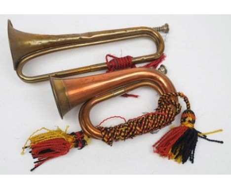 A WWII period copper and brass bugle stamped 'Nadir Ali &amp; Co, Meerut, 1943': (dented) together with later copper and bras