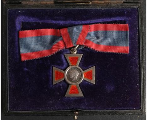 A George V Royal Red Cross, 2nd Class: silver and enamel on lady's bow riband, in Garrard, London case of issue.