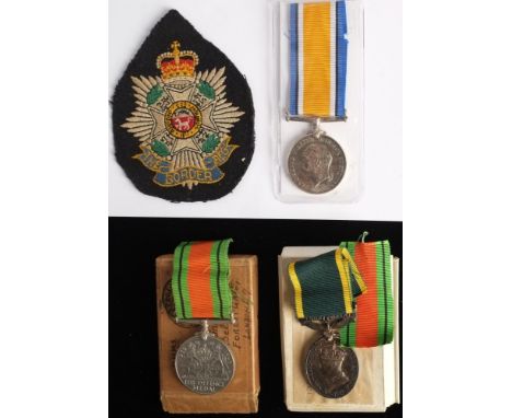A WWI War Medal to '24669 Pte C Gibon Bord R': together with cloth badge, a George VI Efficiency Medal to 2062905 WO CL 1 J H