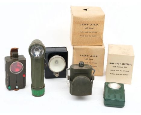 A group of three WWII ARP lamps: together with a No.1 Electric lamp and four other later hand lamps 