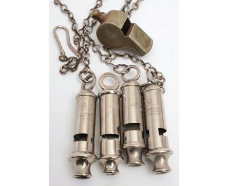A War Department issue 'The Metropolitan' whistle: together with three J Hudson &amp; Co 'ARP' whistles on chains and a Hudso