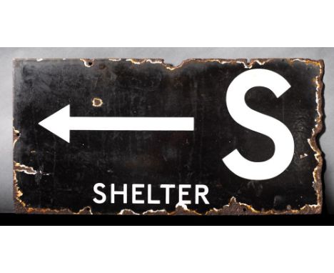 A WWII enamel Air Raid Shelter sign 'S Shelter'  with direction arrow: white text on black ground, 31 x 61cm (damaged)