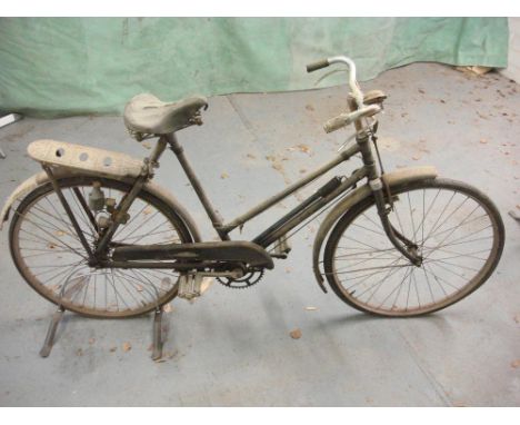 An early 20th century Sun bicycle: step through frame, plated handlebars, bar brakes, rear pannier, chain guard , mud guard a