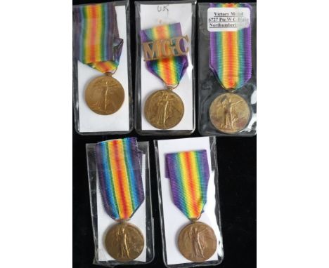 Five WWI Victory Medals:'116730 Pte R J Tottle MGC' with shoulder badge'157354 Gnr F W Vine RA''L M Homer VAD''6727 Pte W C B