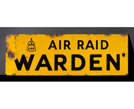 A WWII enamel door sign 'ARP. Air Raid Warden': black text on yellow ground, 7.6 x 22.7cm.