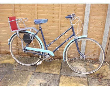 A 1960s BSA lady's bicycle: two tone blue step through frame, plated handlebars, Sturmey Archer three speed gears, BSA  pierc