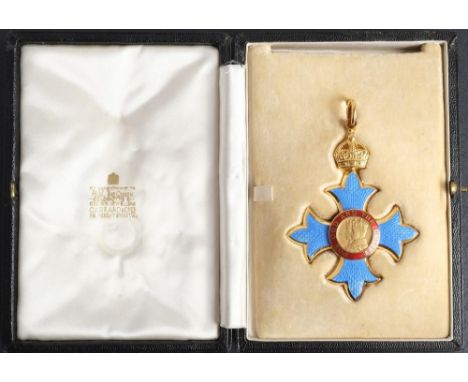 A Military CBE in case of issue: gilt and enamel, (some damage to enamel on lower bar) 