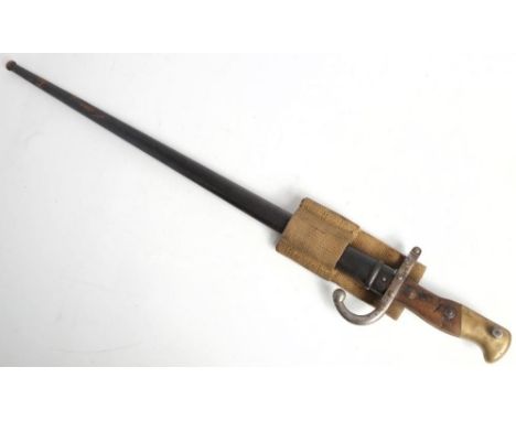 A French Gras Rifle Model 1874 bayonet: the 'T' section blade dated 1876 to top, numbered '60670' to hilt, two piece wooden g